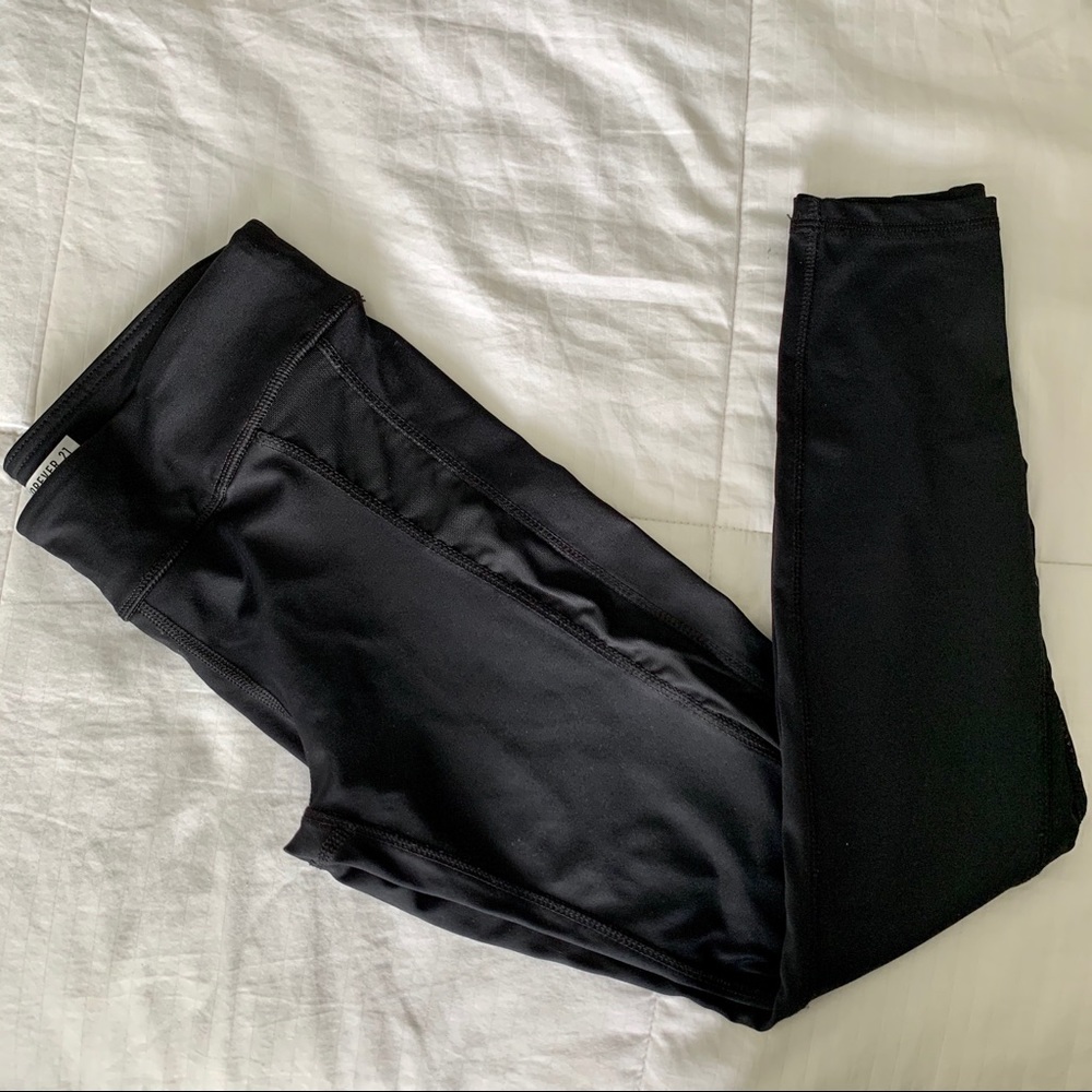 Black workout leggings with mesh detail